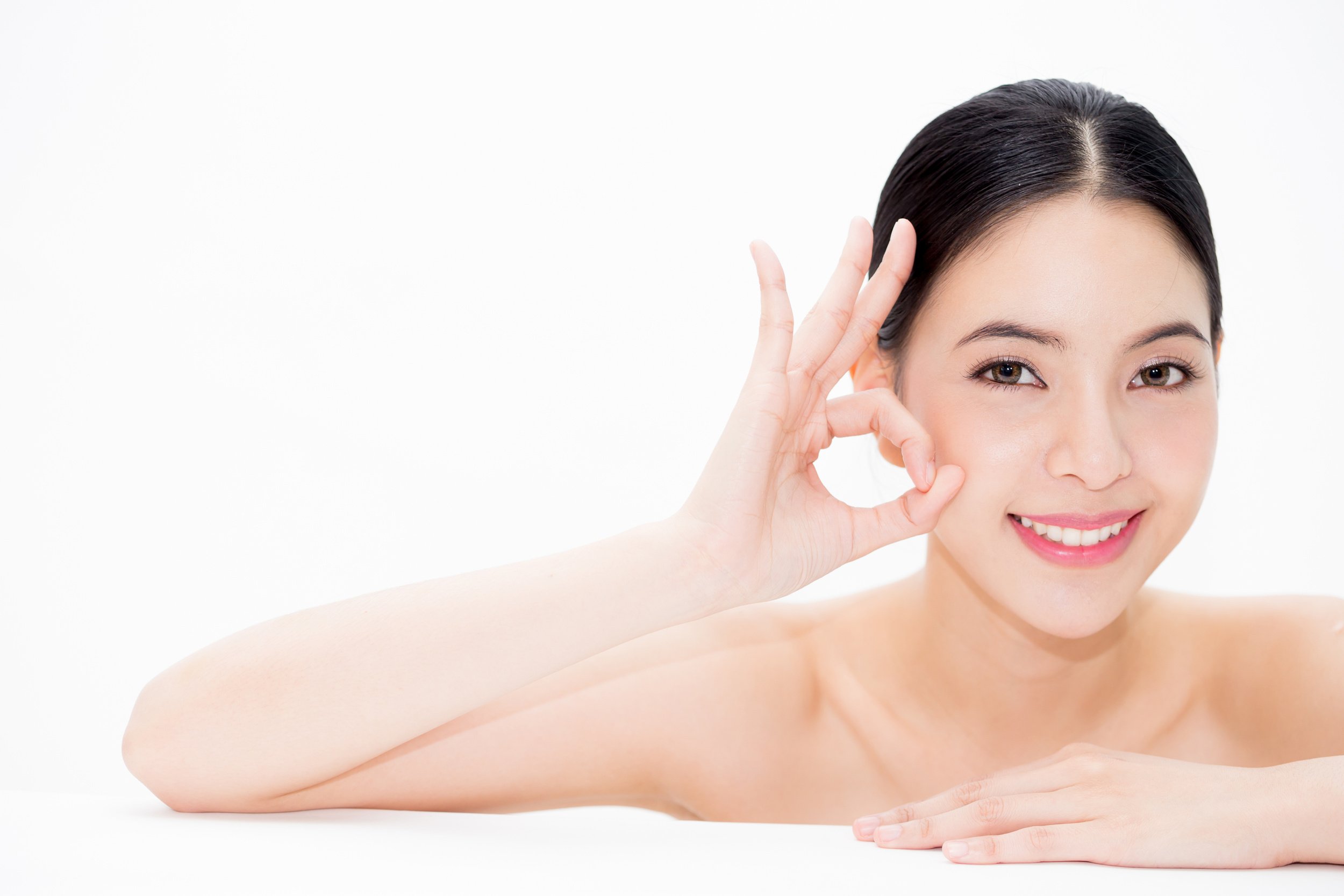 Close-up of Asian Beautiful Healthy Smiling Woman in Beauty Skin