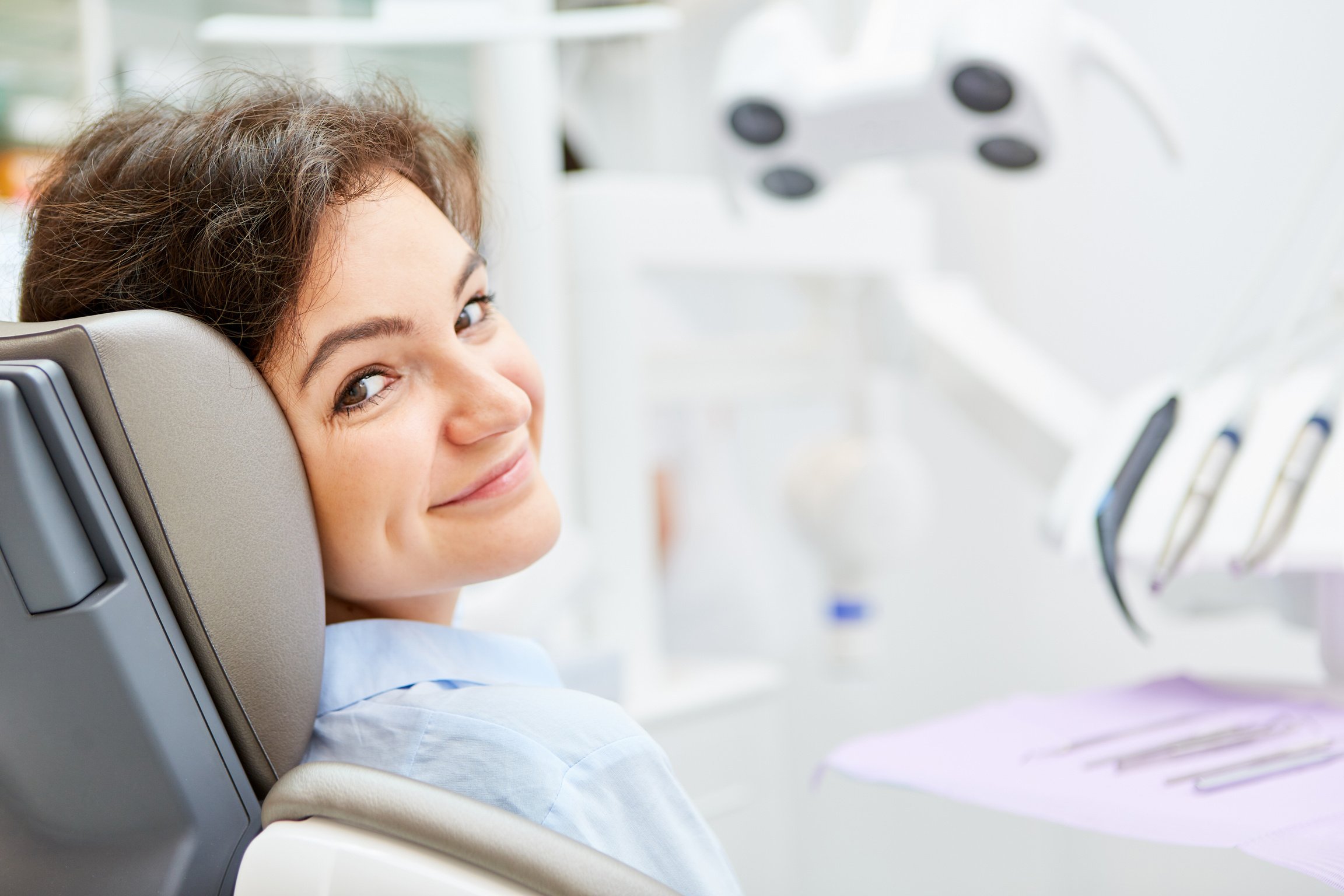 Patient in the Dentist Chair Is Waiting for Treatment